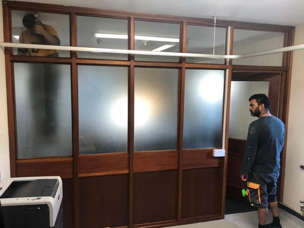 Completed partition with glass sections