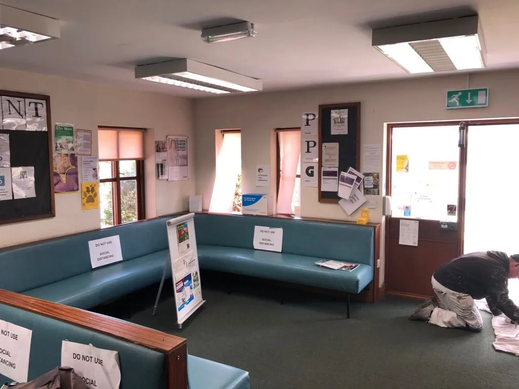 The reception area displaying signage about the decorating